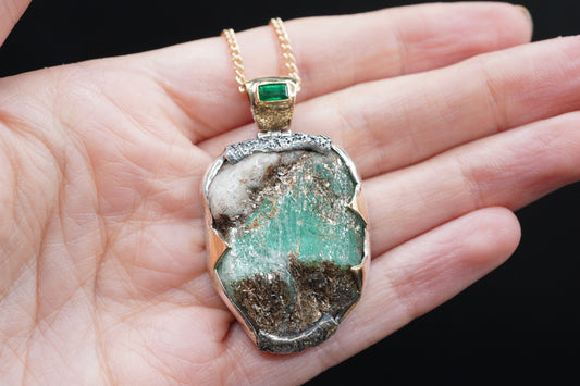 Rough Emerald with Faceted Emerald Pendant with 18ct Gold & Sterling Silver