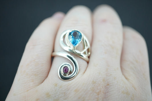 Blue Topaz and Star Ruby Sterling Silver Swirl Ring