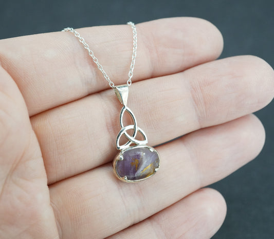 Melody's Stone Super Seven Sterling Silver Celtic Oval Pendant