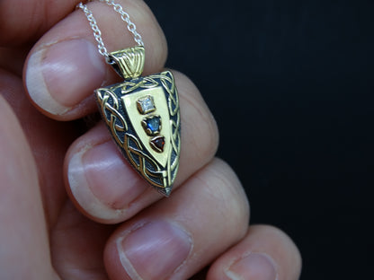 Fancy Trillion Scottish Sapphire, Elie Ruby and Diamond Pendant image 1
