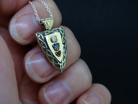 Fancy Trillion Scottish Sapphire, Elie Ruby and Diamond Pendant image 1