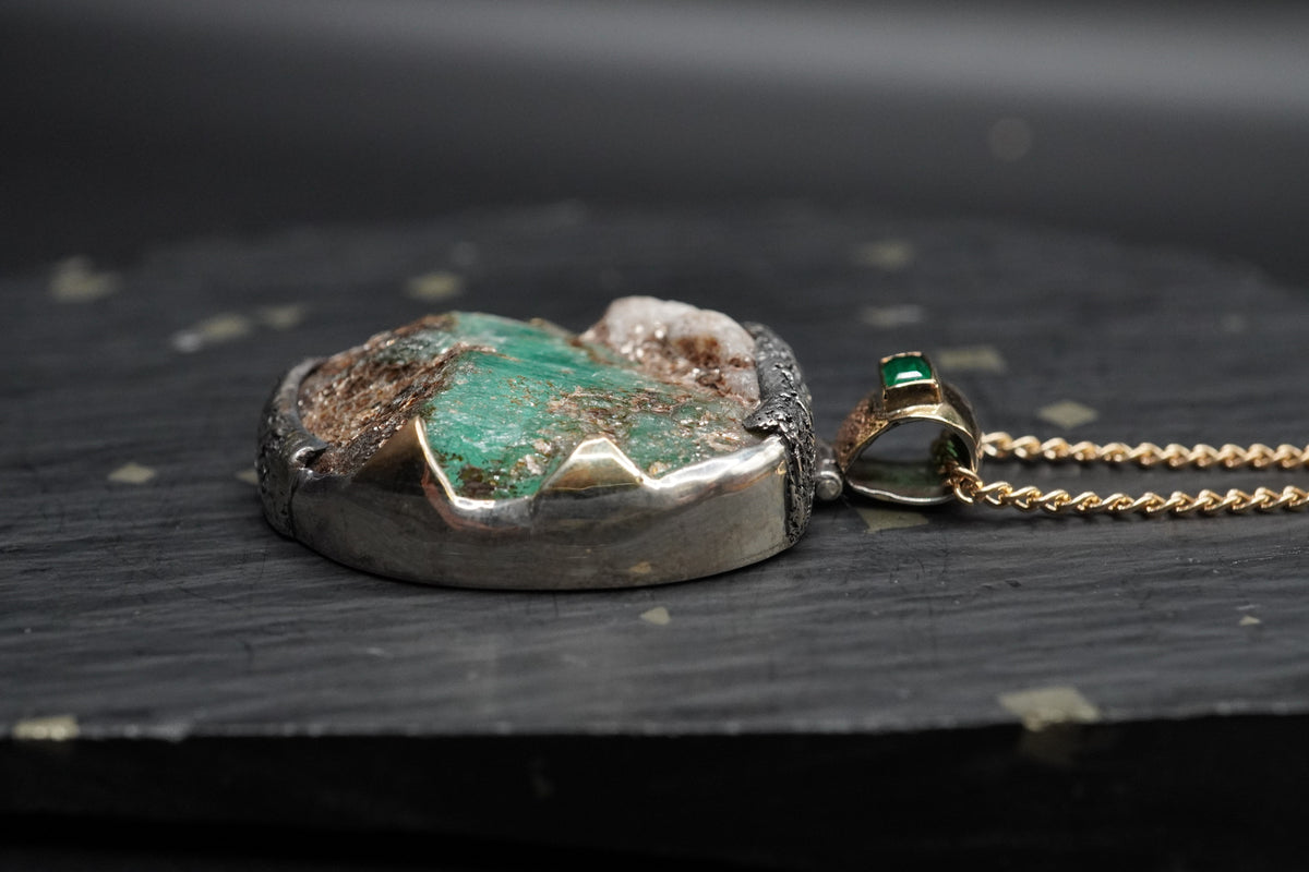 Rough Emerald with Faceted Emerald Pendant with 18ct Gold & Sterling Silver