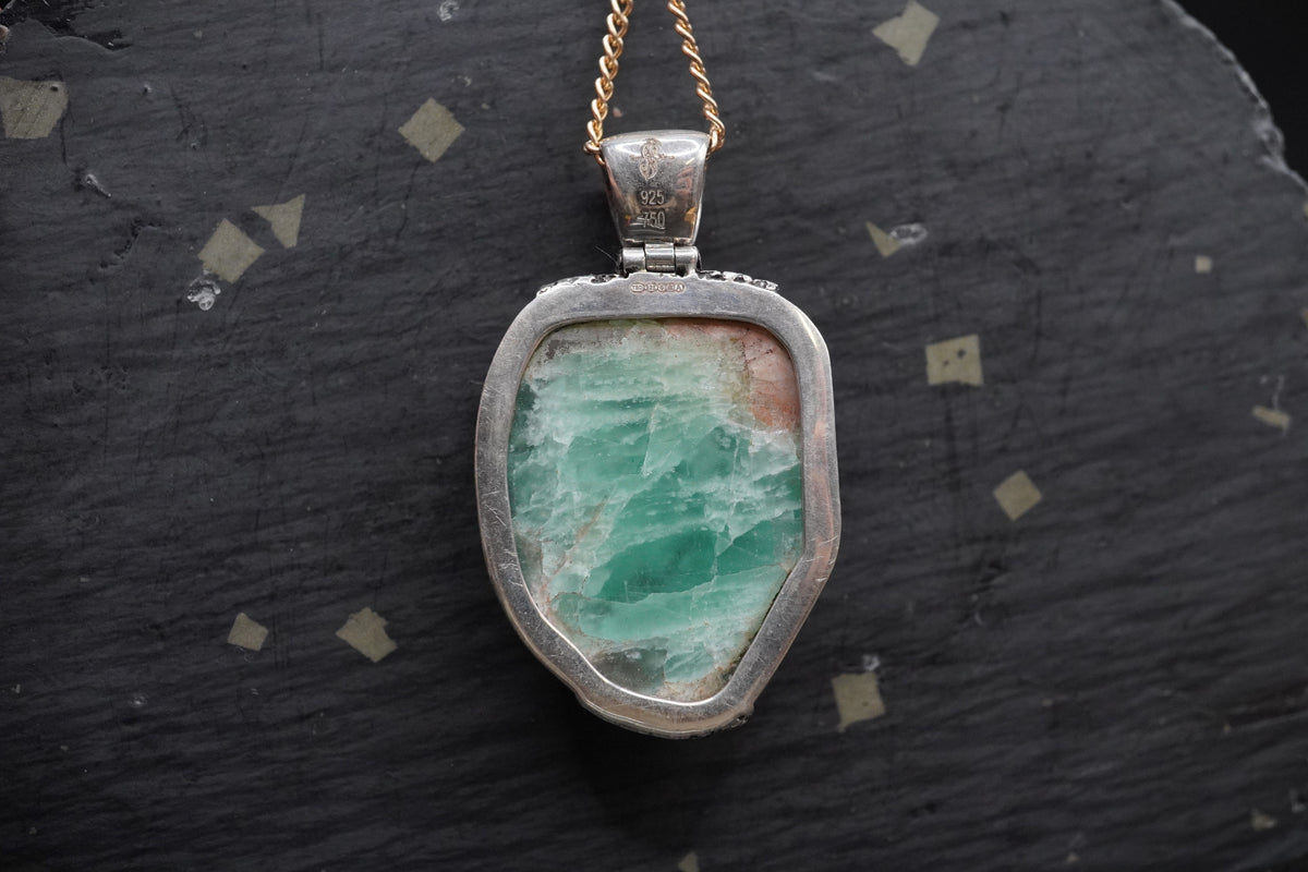 Rough Emerald with Faceted Emerald Pendant with 18ct Gold & Sterling Silver