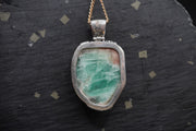 Rough Emerald with Faceted Emerald Pendant with 18ct Gold & Sterling Silver