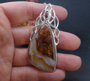 Arizona Fire Agate & Garnet Sterling Silver Celtic Pendant