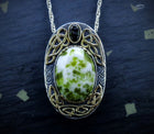 'Eilean Naomh' Iona Marble & Tourmaline, on a Scottish Gold & Silver Pendant