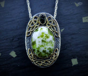 'Eilean Naomh' Iona Marble & Tourmaline, on a Scottish Gold & Silver Pendant