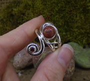 Lewisian & Garnet Celtic Twist Sterling Silver Ring
