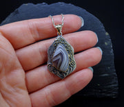 'Fehu' Ardownie Agate, on a Scottish Gold & Silver Pendant