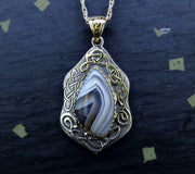 'Fehu' Ardownie Agate, on a Scottish Gold & Silver Pendant