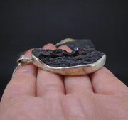 Twin Alaskan Garnets in Mica Sterling Silver Pendant