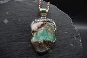Rough Emerald with Faceted Emerald Pendant with 18ct Gold & Sterling Silver