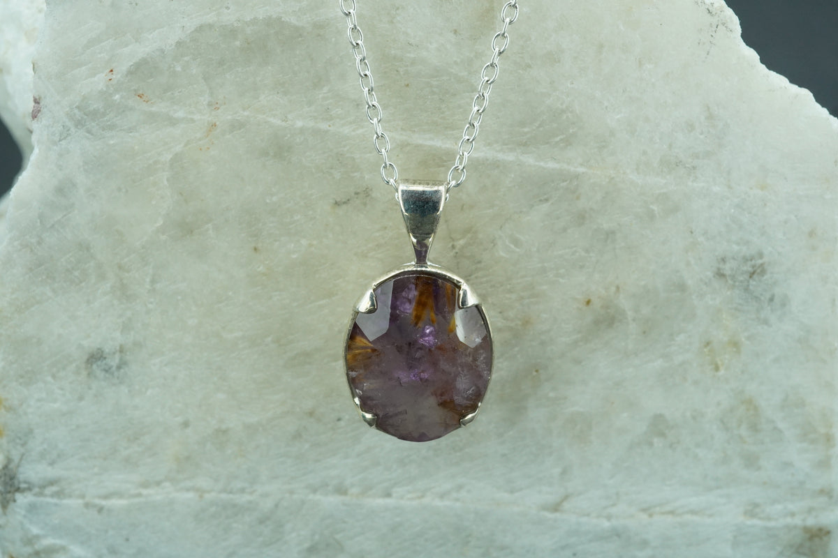 Melody's Stone Super Seven Sterling Silver Oval Pendant