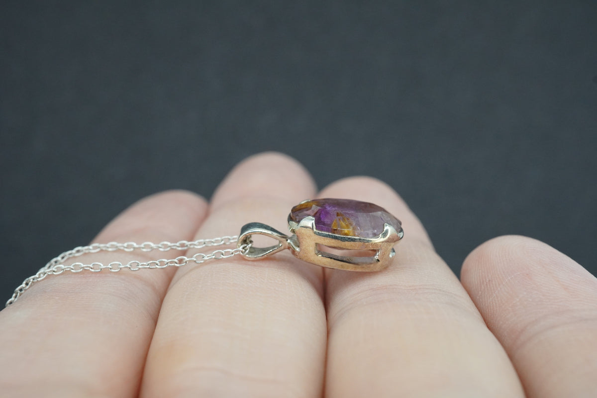 Melody's Stone Super Seven Sterling Silver Oval Pendant