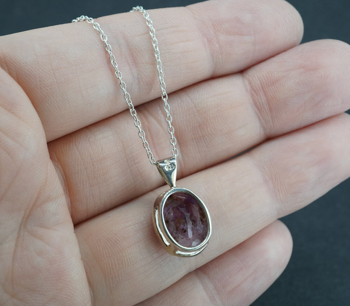 Melody's Stone Super Seven Sterling Silver Oval Pendant