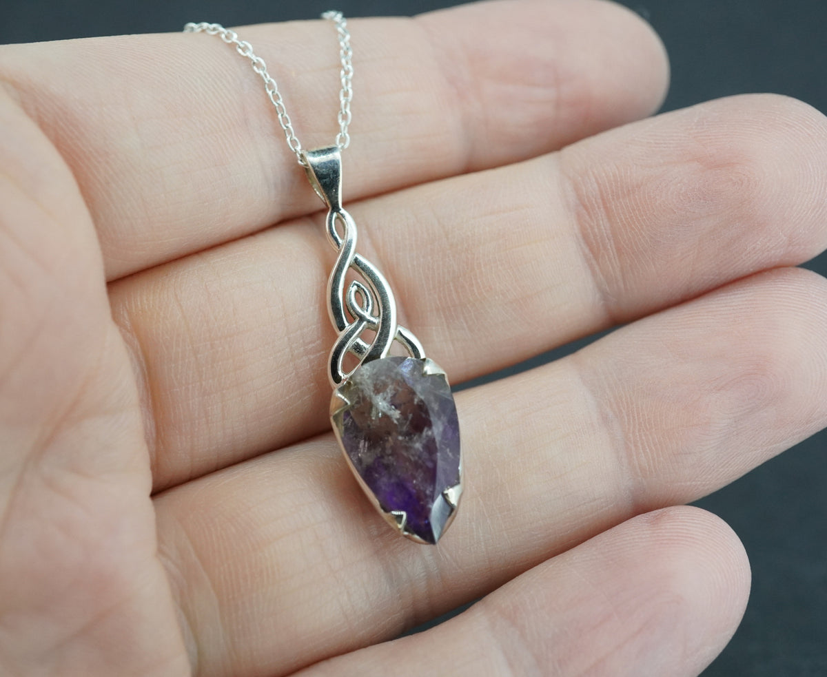 Melody's Stone Super Seven Sterling Silver Oval Pendant