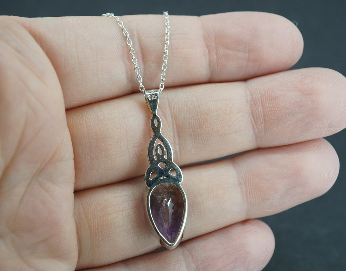Melody's Stone Super Seven Sterling Silver Oval Pendant