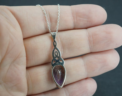 Melody's Stone Super Seven Sterling Silver Oval Pendant