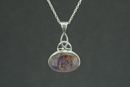 Melody's Stone Super Seven Sterling Silver Oval Celtic Pendant