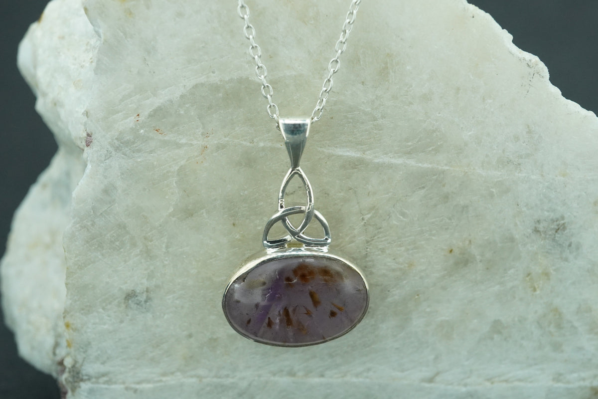 Melody's Stone Super Seven Sterling Silver Oval Celtic Pendant