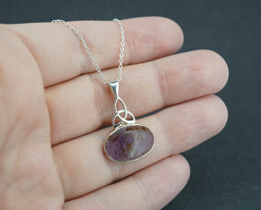 Melody's Stone Super Seven Sterling Silver Oval Celtic Pendant