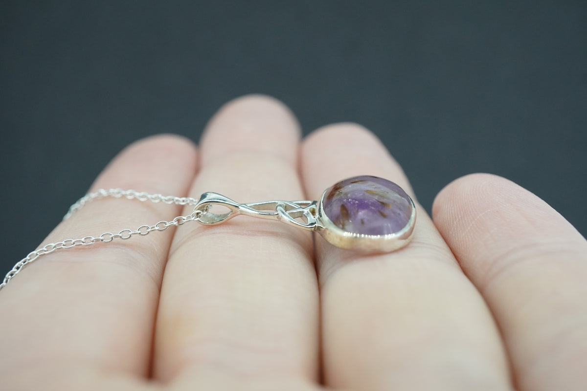 Melody's Stone Super Seven Sterling Silver Oval Celtic Pendant