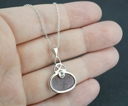 Melody's Stone Super Seven Sterling Silver Oval Celtic Pendant