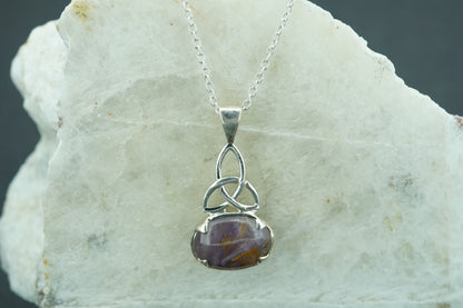 Melody's Stone Super Seven Sterling Silver Celtic Oval Pendant