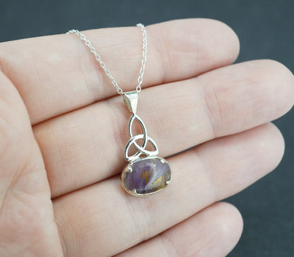 Melody's Stone Super Seven Sterling Silver Celtic Oval Pendant