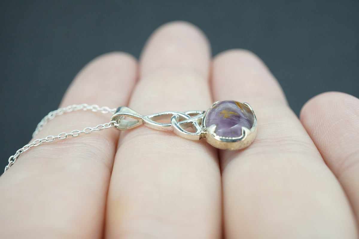 Melody's Stone Super Seven Sterling Silver Celtic Oval Pendant