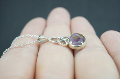 Melody's Stone Super Seven Sterling Silver Celtic Oval Pendant