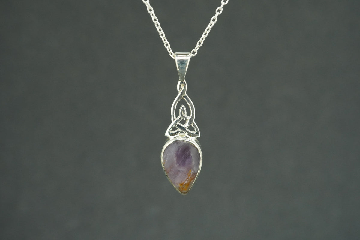 Melody's Stone Super Seven Sterling Silver Medium Knot Pendant