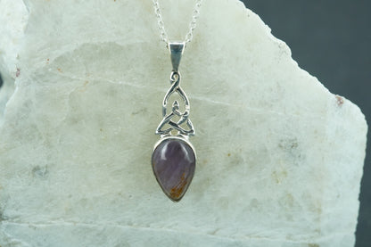 Melody's Stone Super Seven Sterling Silver Medium Knot Pendant