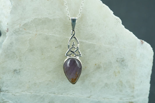 Melody's Stone Super Seven Sterling Silver Medium Knot Pendant
