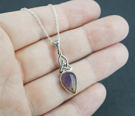 Melody's Stone Super Seven Sterling Silver Medium Knot Pendant
