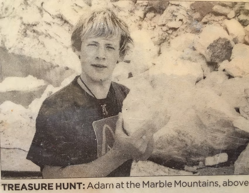 TREASURE HUNT: Adam at the Marble Mountains, above